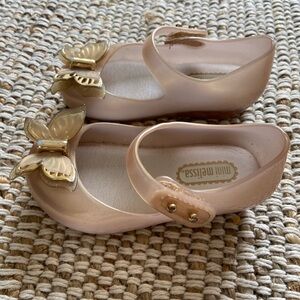 Mini Melissa Size 6 toddler girl shoes 
Gold butterfly